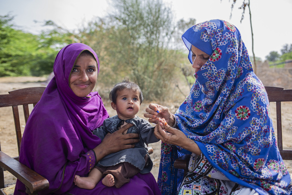 On 14 March 2023, health worker Kaim K. tests 6-month-old Muhammad for malaria in Naseerabad. The activity was supported by WHO.  The 2022 floods resulted in the worst malaria outbreak in Pakistan since 1973. In response, international health organizations such as WHO and the Global Fund came together with local governments and NGOs to combat the malaria outbreak and help address the extraordinary scale of need. The response drew on both the oldest and newest interventions in the anti-malaria tool kit. In the makeshift refugee camps, nets were distributed, tents (and what houses remained) were sprayed with insecticides, and mass drug administration campaigns were conducted to quickly treat as many people as possible.   Related: https://www.who.int/news-room/feature-stories/detail/It-was-just-the-perfect-storm-for-malaria-pakistan-responds-to-surge-in-cases-following-the-2022-floods