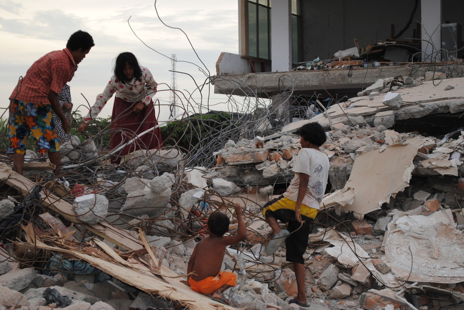 Earthquake in Sumatra, Indonesia


Feature on damage and destruction to infrastructure.

A family searching the rubble of a building damaged by the earthquake in Indonesia.