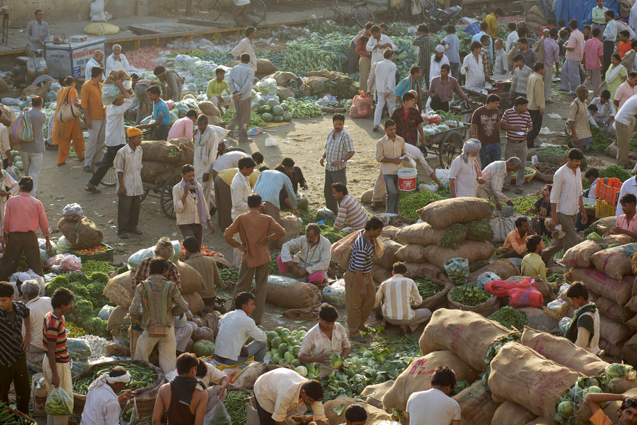 This series focuses on different aspects of having influenza in India.

A crowd of traders at a wholesale vegetable market in Delhi.