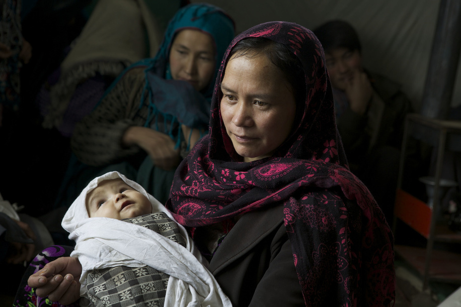 Mobile Clinic Afghanistan.

Fatima, aged 30 and mother of 5 children, holds her child of 10 months, Hania, while waitingto be examined at a mobile clinic facilitated by WHO in the Kaj Nāw village located in the Panjab district in Bamiyan, Afghanistan.
