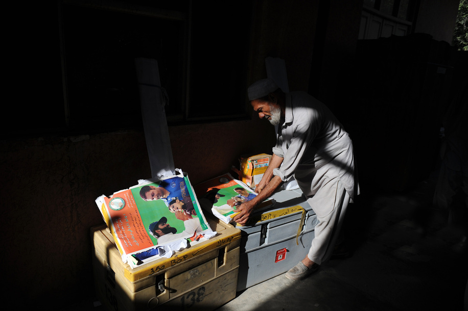 Polio vaccination campaign in Afghanistan. 

Afghan coordinators collect vaccine supply a day before the start of national polio vaccination campaign from vaccine main department in Jalalabad.