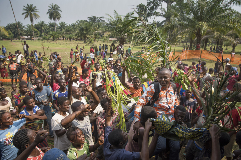 Lucien Ambunga, Catholic Priest and Pastor of Itipo returns home to his parishioners in Itipo village after surviving Ebola. Read more about Lucien returning home after surviving Ebola: http://www.afro.who.int/news/returning-home-after-surviving-ebola-democratic-republic-congo