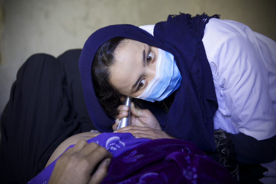 Mobile Clinic Afghanistan.

Shakila midwife listens to the heartbeat of a pregnant woman at the mobile clinic organized by WHO at the Garm Abak of Waras district in Bamiyan, Afghanistan.