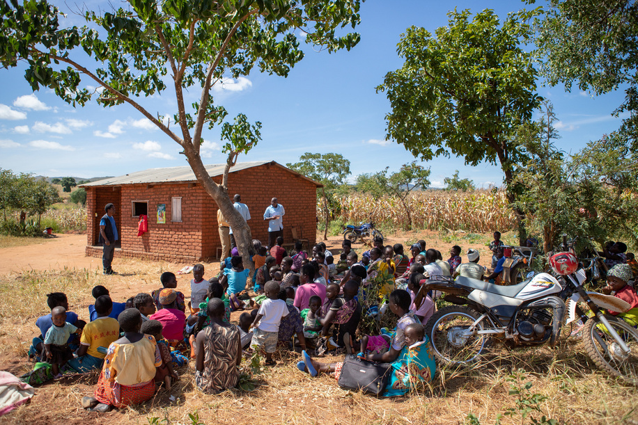 School in Malawi used as a place to gather people from the community and talk about prevention and control measures for Malaria by WHO experts. � Read more: https://www.who.int/news-room/feature-stories/detail/mothers-welcome-world-s-first-malaria-vaccine-in-malawi  