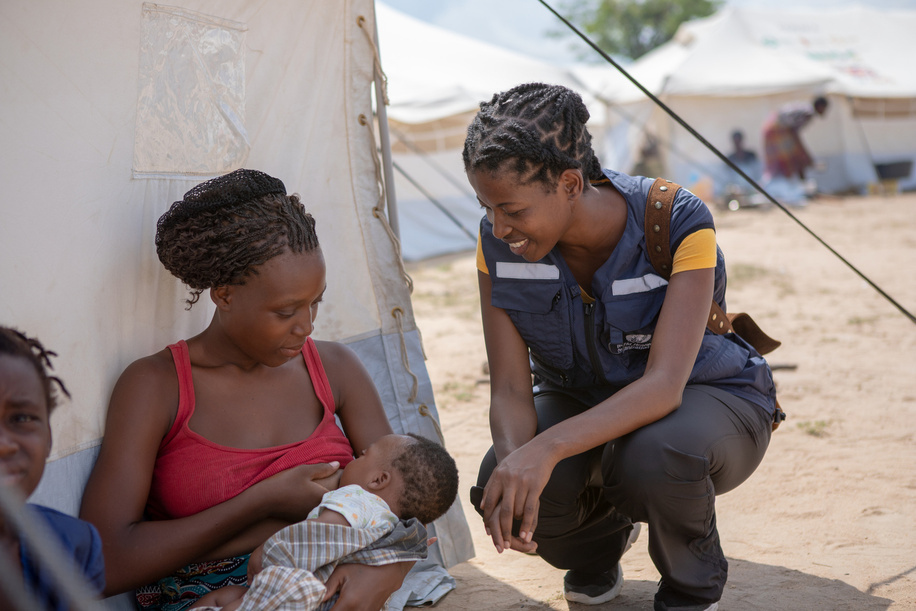 Woman breastfeeding a baby while waiting to receive support at the Samora Machel accommodation center in Dondo following Cyclone Idai devastation. 

WHO and partners are supported local health services for ongoing needs, including pregnancy care, malnutrition screening, and plans for child health interventions including deworming, vitamin A supplements, and measles vaccination during the emergency campaign.