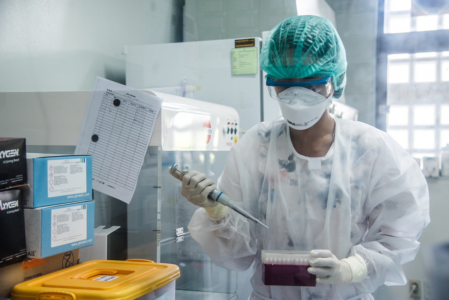A technician testing for COVID-19 in the RT-PCR lab at the Department of Medical Sciences of the Ministry of Public Health.