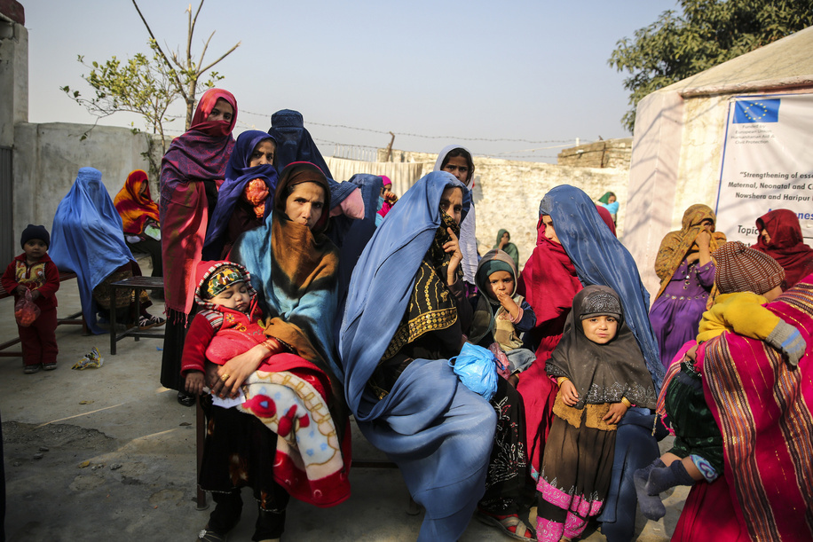 Health facilities in Pakistan Women with their children waiting for their turn in EPI (Expanded Program on Immunization) center in Basic Health (BHU) Unit Akora II, Nowshera District.