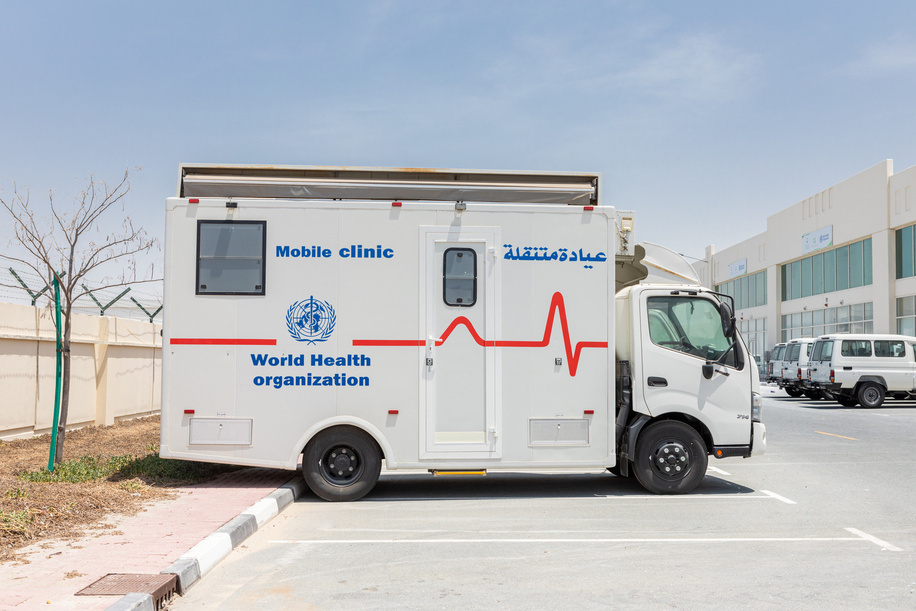 A mobile clinic outside the WHO warehouses in Dubai. The World Health Organization’s Health Emergencies Programme maintains a Logistics hub located within the International Humanitarian City in Dubai. The WHO/Dubai operation maintains over 17,000 square meters of temperature-controlled warehousing and manages an inventory of medicines, medical supplies, and equipment valued at USD 40 million. The operation provides support to health emergencies across the globe in response to all types of events ranging from natural disasters to outbreaks of infectious disease. Since the start of the COVID-19 pandemic, the WHO/Dubai operation has expanded to over 4 times its original size and has completed over 324 shipments to 108 destinations across all 6 WHO geographic regions. With the implementation of a WMS (warehouse management system) including bar-coding and scanning, the operation will gain significant efficiencies in managing inventory and rapidly dispatching supplies. The Operation established a dashboard to increase the visibility of supply chain data to support the tracking and monitoring of medical supplies dispatched from the logistics hub. Most recently, in response to the blast in Beirut, Lebanon the operation responded within 24 hours by delivering over 20 metric tons of trauma and surgical supplies; clearly demonstrating the rapid response capability and advantages of maintaining a pre-positioned supply of critical medical supplies and equipment.