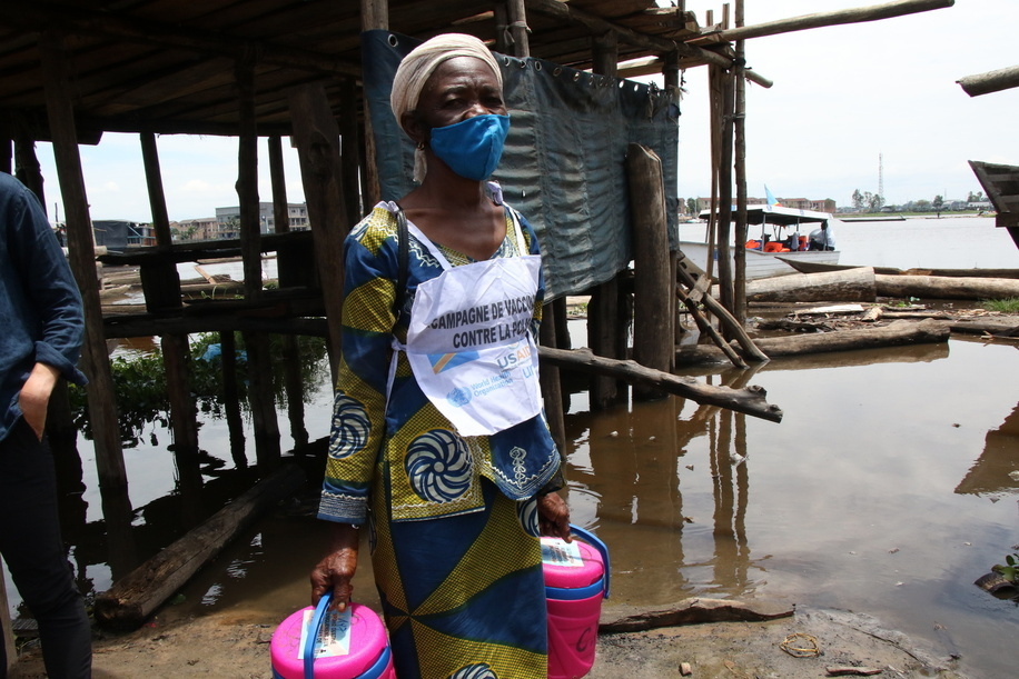 Mosobe Ngoy, 57, has been a vaccinator since 2014. Here she is out on a polio vaccination campaign on the small islands around Kinshasa on the Congo River. The campaign was launched by the Ministry of Health with WHO and partners support, targeting children under 5 years old.