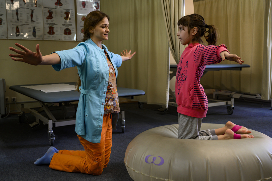 Patient during WAFF ® therapy for better balance and coordination with a therapist during her physical rehabilitation process at Russian Children's Clinical Hospital in Moscow. Diagnosis: nervous system degenerative disease, EAST-syndrome, subcortical-cerebellar syndrome.