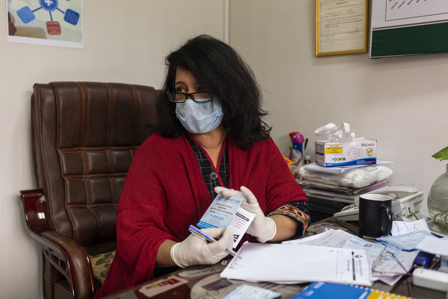 Dr Rukhsana Bashir, a quality assurance officer, photographed in her office on 1 Feb 2021 at the Family Health Hospital in Lahore, Pakistan.

Dr Bashir has been trained by WHO to use its clinical and policy guidelines: Responding to intimate partner violence and sexual violence against women. She further trains health workers how to provide survivor-centered care including how to ask about violence and how to provide first-line support. 

Dr Bashir is one of more than 1000 doctors, nurses, hospital administrators and community health workers, including midwives who were trained between 2018-2020 as part of the roll out of the clinical and policy guideline package by Pakistan Ministry of National Health Services Regulation and Coordination and provincial health departments, with technical support from WHO and sister UN agencies, to strengthen the countryhealth systems response to gender-based violence.

When women come to the clinic, they don't think that they are going to discuss the problem [of violence], but I have to ask them a few bold questions. In the beginning they are afraid and don't want to tell me anything, but you have to identify their problems. Only then can you offer better services and treatment,