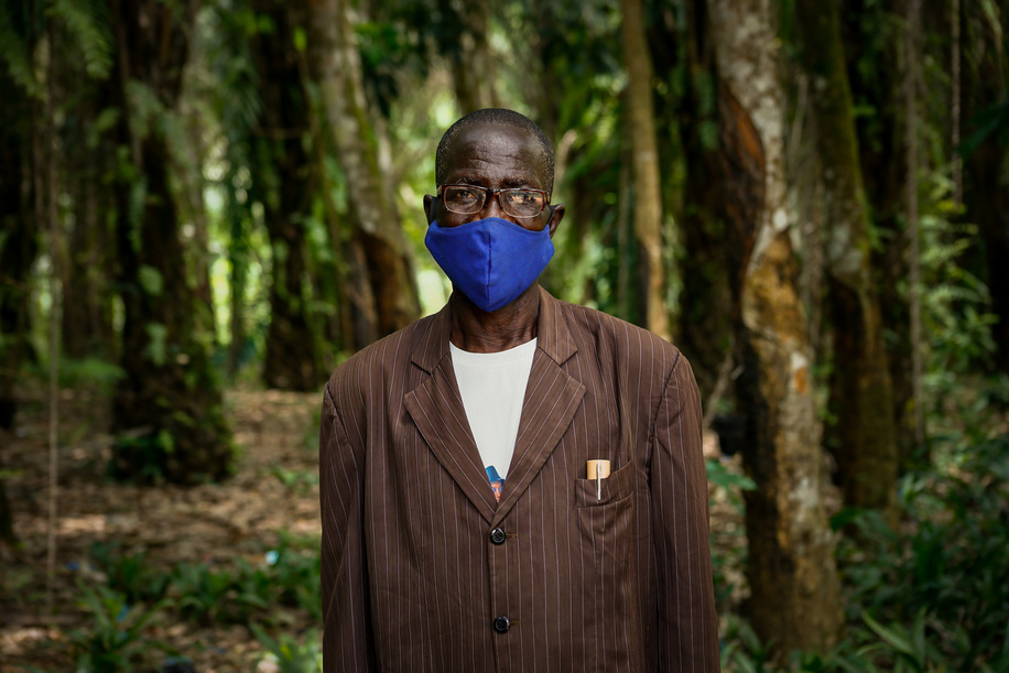 On 1 March 2021, Chief Mankoye Delamon poses for a portrait in the town of Sibata near the Guinea/Liberia border. As part of the Ebola outbreak response, WHO and parters work with local leaders to help engage communities with provide them with information about how to protect themselves and prevent the spread of the virus. This is the first time the disease has been reported in Guinea since the previous outbreak ended in 2016. The Ministry of Health of the Republic of Guinea announced a new outbreak of Ebola virus disease on 14 February 2021 after a cluster of cases was reported in in the sub-prefecture of Gouéké, N’Zérékoré Region. WHO is supporting the Government-led response to set up testing, treatment structures, and with medical supplies, vaccines, therapeutics, and diagnostic capacities to quickly contain the outbreak.