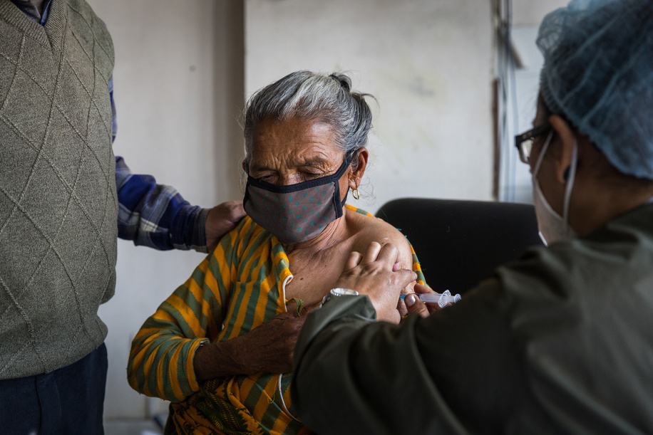 On 11 March 2021, Dhana Laxmi Gautam receives COVID-19 vaccine at Paropakar Maternity and Women’s Hospital in Kathmandu, Nepal.