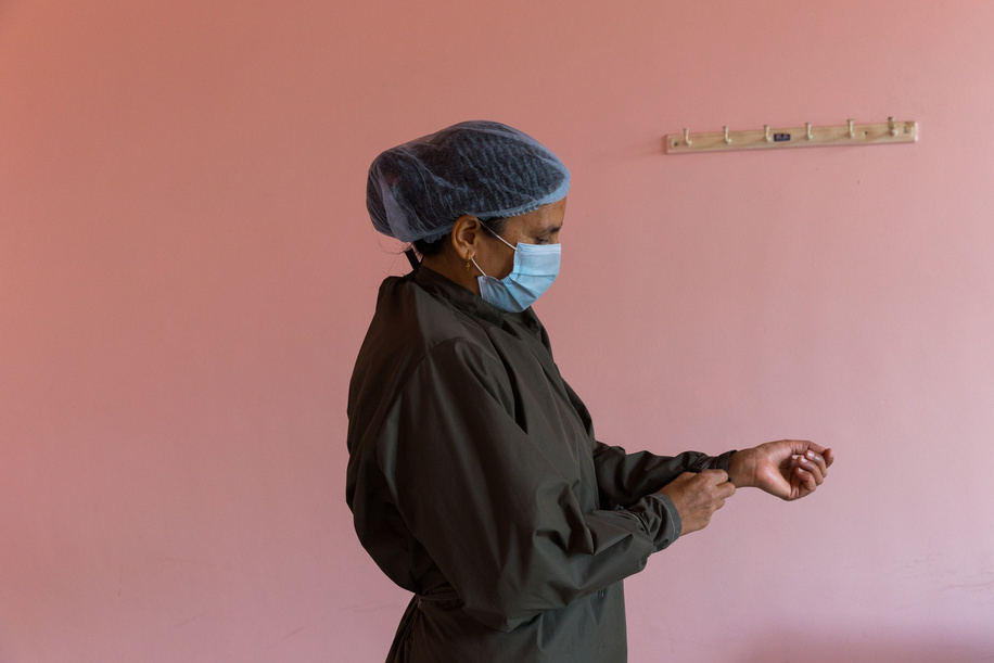 On 12 March 2021, Senior Vaccinator Sarita Bajagain prepares to administer COVID-19 vaccines at Paropakar Maternity and Women’s Hospital in Kathmandu, Nepal.