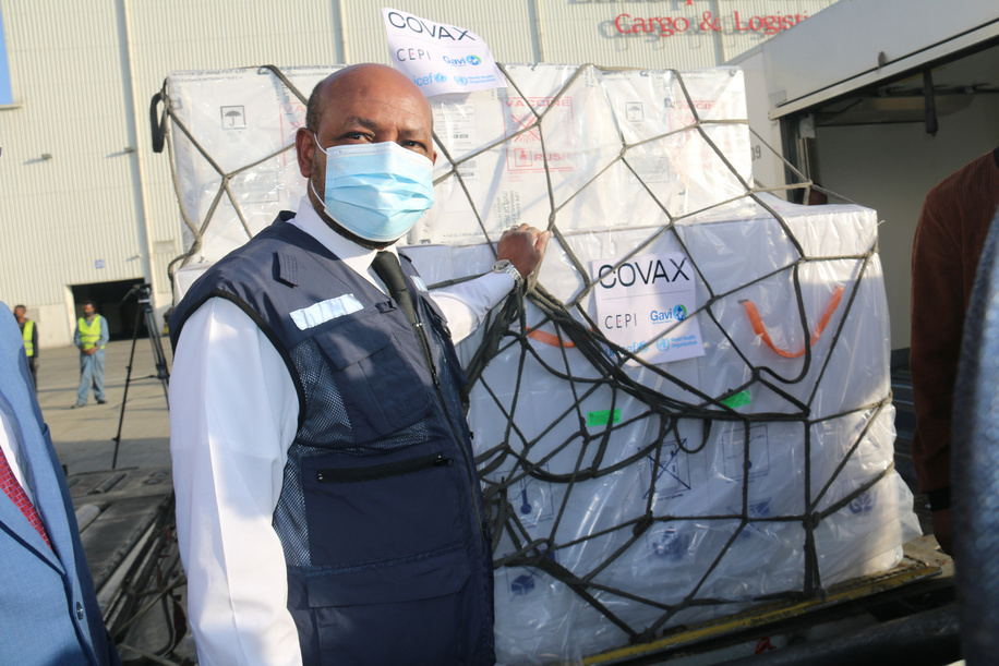 On 7 March 2021, Dr Boureima Hama Sambo, Ethiopia's WHO representative, helps to receive Ehtiopia's first consignment of COVID-19 vaccine. 2.2 million doses of the AstraZeneca COVID-19 vaccine arrive at Bole International Airport in Addis Ababa, Ethiopia. The delivery was facilitated by the COVAX mechanism and marks the start of the country’s COVID-19 vaccination campaign, which launched on March 13.
“The arrival of the vaccines in Addis Ababa is a major milestone, a turn of the tides for the better, in the response to the COVID-19 pandemic, thanks to the coordinated global action for equitable vaccine distribution,” Dr Boureima Hama Sambo, WHO Representative in Ethiopia, said. “WHO will continue to work with the Government of Ethiopia and global partners to ensure that Ethiopia receives, deploys and administers adequate quantities of COVID-19 vaccines to the Ethiopian people, because as WHO has repeatedly said, no one is safe until everyone is safe.” 
COVAX, the vaccines pillar of the Access to COVID-19 Tools (ACT) Accelerator, is co-led by the Coalition for Epidemic Preparedness Innovations (CEPI), Gavi, (the Vaccine Alliance) and the World Health Organization (WHO) – working in partnership with developed and developing country vaccine manufacturers, UNICEF, the World Bank, and others. It is the only global initiative that is working with governments and manufacturers to ensure COVID-19 vaccines are available worldwide to both higher-income and lower-income countries.