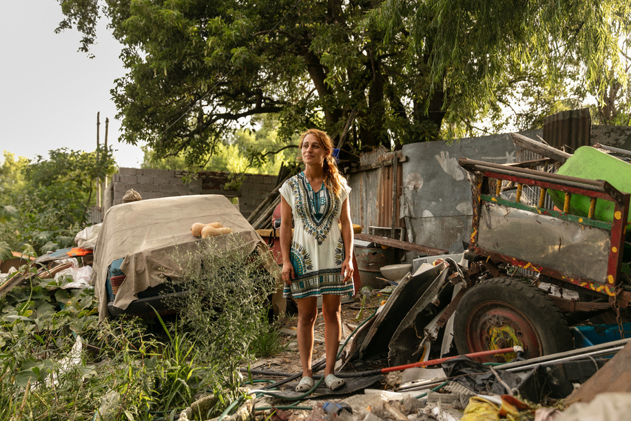 Portrait of Maria Carballo, standing in the front of her home in a settlement located across from the main garbage dump in Montevideo, Uruguay, on 1 March 2021. - In Uruguay’s low-income neighborhoods, it is common for people to burn cables, discarded electronic equipment, batteries or other e-waste to recover metals for profit. In some settlements, large spots of burned lead can be seen on the street. Other contaminants include mercury and dioxides. While these “urban mining” activities are illegal, it is how many people make their living. E-waste is a health and environmental hazard, containing toxic additives or hazardous substances which damage the human brain, among other systems. The WHO Initiative on E-waste and Child Health was launched in 2013. With 25% of children in Uruguay now showing high levels of lead in their blood, one of the top priorities is protecting children from lead poisoning. Young children are particularly vulnerable to lead exposure as they absorb four to five times as much ingested lead as adults from a given source. Health consequences are serious as at high levels of exposure, lead poisoning attacks the brain and central nervous system, causing coma, convulsions, intellectual disabilities and even death. At lower levels of exposure, lead can affect a child’s brain development, resulting in reduced intelligence quotient and diminished educational attainment. Unidad Pediátrica Ambiental (UPA) is a national pediatric centre that specializes in environmental health and is connected to WHO’s Children’s Environmental Health programme. The centre is part of the toxicology department in the School of Medicine of the Universidad de la República, located inside the Claveaux centre of Health in Montevideo, Uruguay. UPA aims to prevent diseases that are generated by environmental contaminants, especially in children. Doctors at UPA treat children, adolescents, and pregnant women. UPA is also an education facility where both graduate and postgraduate students learn about and practice medicine related to toxicology and contaminants. Most patients come to UPA because of intoxications with lead, mercury, carbon monoxide or pesticides.