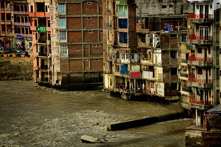 A view of buildings that were affected by flooding in the village of Madyan in Pakistan's Swat valley on 1 September 2022. Catastrophic floods in Pakistan in August 2022 killed some 1,400 people, destroyed more than half a million homes and displaced over 660,000 people into camps. Many more people are displaced in host communities. More than 750,000 livestock – a critical source of income for many families – died after the rainfall, which in August was more than five times the national 30-year average in some parts of Pakistan. According to the Food and Agriculture Organization, the floods damaged 1.2 million hectares of agricultural land in Sindh Province alone. Some 33 million people have been affected, and access to many vulnerable communities was cut off as hundreds of bridges and thousands of kilometres of roads were destroyed or washed away.  WHO is supporting the Government of Pakistan to respond by delivering supplies needed by health facilities and increasing disease monitoring to prevent the spread of infectious diseases. https://www.who.int/emergencies/situations/pakistan-crisis