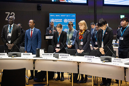 Delegates observe a moment of silence during a briefing on the margins of the Executive Board meeting on 7 February 2023. The briefing covered the situation in Türkiye and Syria after a devastating earthquake and multiple aftershocks hit south-east Türkiye and north-west Syria on 6 February 2023. 152nd session of the WHO Executive Board at WHO headquarters in Geneva, Switzerland. Related: https://www.who.int/about/governance/executive-board/executive-board-152nd-session
