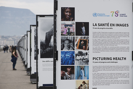 On 22 April 2022, a general view of "Picturing Health," a photography exhibition to mark WHO’s 75th anniversary on display along Quai Wilson in Geneva, Switzerland. The outdoor exhibition, on the shores of Lake Geneva from 3 April to 1 May 2023, contains more than 50 photos carefully selected from WHO’s photography collection of more than 58 000 images. It documents many of the public health successes over the past 75 years, and also highlights current and future health challenges.  Related: https://www.who.int/news-room/events/detail/2023/04/03/default-calendar/picturing-health-75-years-of-progress-and-challenges https://photos.hq.who.int/galleries/1244/picturing-health-75-years-of-progress-and-challeng