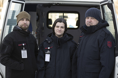 Portraits of EMT ( Emergency Medical Team) staff at the Centre of Disaster Medicine in Kyiv, Ukraine, in February 2023.  Pictured here from left: Surgeon Pavlo, Nurse Olha, Surgeon Ihor.