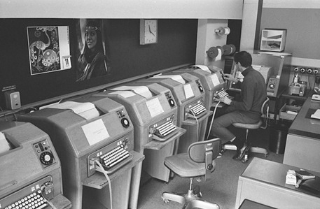WHO headquarters building in Geneva, Switzerland. Banks of telex machines at WHO headquarters in Geneva keep the Organization in touch 24 hours a day with the progress of epidemics and communicable diseases around the world. - c.1970