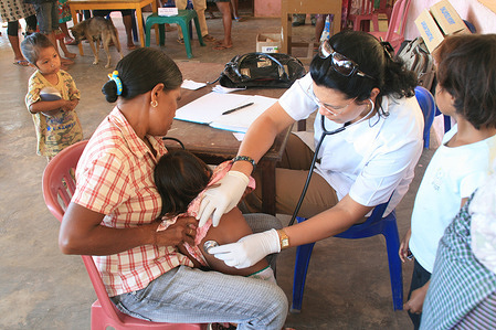 Health work assisting patient at SISCa programme (Integrated Community Health Services), Balibar.