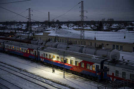 Here the Saint Lukas medical train sits in the Kashtan Bogotol region, Krasnoyarsk Krai, Siberia, Russian Federation, on Dec. 17, 2020. The train, funded by the government, travels to remote stations covering around 4 000 km of Krasnoyarsk and Khakassia in Siberia during the year. Normally the train runs for two-week journeys, 10 times a year, stopping over at about eight stations on each journey Each stop lasts for one to three days and, during that time, doctors and nurses provide residents with basic medical care. The train has a lab for blood analysis, EKG and EEG (electrocardiogram) monitors, an ultrasound, and an x-ray machine. The 12-15 doctors and their assistants examine up to 120-150 patients a day, seeing around 15 000 patients per year. The medical treatment on the train is free of charge. Specialists make diagnoses and prescribe medication or referrals to seek specialist help at the hospitals of the region's capital.