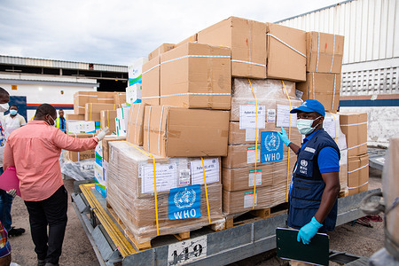 On April 18 2020, the UN Solidarity Flight lands in Brazzaville with essential medical supplies in the fight against COVID-19.  WHO Congo Procurement Assistant Polipos, receives the cargo with support from the Ministry of Health of Congo and the World Food Programme at the Maya Maya International Airport.