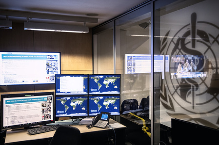 Illustration of the back office of the Strategic Health Operations Centre (SHOC) at WHO headquarters in Geneva, Switzerland, on 11 December 2020.  In order to minimize the risk of introducing COVID-19 into the headquarters premises, WHO continues to ensure that personnel have access to a safe and healthy work environment, and that all appropriate measures are in place to minimize the risk to the workforce. Ensuring the safety of all WHO staff and their families requires a new way of working on WHO campus.