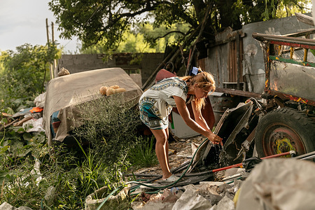 María washes her hands in front of her home in a settlement located across from the main garbage dump in Montevideo, Uruguay, on 1 March 2021. - In Uruguay’s low-income neighborhoods, it is common for people to burn cables, discarded electronic equipment, batteries or other e-waste to recover metals for profit. In some settlements, large spots of burned lead can be seen on the street. Other contaminants include mercury and dioxides. While these “urban mining” activities are illegal, it is how many people make their living. E-waste is a health and environmental hazard, containing toxic additives or hazardous substances which damage the human brain, among other systems. The WHO Initiative on E-waste and Child Health was launched in 2013. With 25% of children in Uruguay now showing high levels of lead in their blood, one of the top priorities is protecting children from lead poisoning. Young children are particularly vulnerable to lead exposure as they absorb four to five times as much ingested lead as adults from a given source. Health consequences are serious as at high levels of exposure, lead poisoning attacks the brain and central nervous system, causing coma, convulsions, intellectual disabilities and even death. At lower levels of exposure, lead can affect a child’s brain development, resulting in reduced intelligence quotient and diminished educational attainment. Unidad Pediátrica Ambiental (UPA) is a national pediatric centre that specializes in environmental health and is connected to WHO’s Children’s Environmental Health programme. The centre is part of the toxicology department in the School of Medicine of the Universidad de la República, located inside the Claveaux centre of Health in Montevideo, Uruguay. UPA aims to prevent diseases that are generated by environmental contaminants, especially in children. Doctors at UPA treat children, adolescents, and pregnant women. UPA is also an education facility where both graduate and postgraduate students learn about and practice medicine related to toxicology and contaminants. Most patients come to UPA because of intoxications with lead, mercury, carbon monoxide or pesticides.